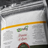 100g Pierre d'Alun Poudre Cristaux | 123NATY — Détail macro du flacon