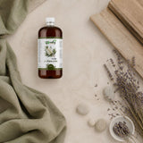 1L Huile d'Arbre de Thé Végétale | 123NATY — Ambiance flat lay
