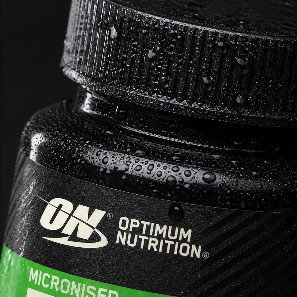Musc Noir Opium en Carrés – Parfum Solide – Senteur Intense & Longue Tenue | 123NATY — Détail macro du flacon