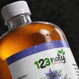 Pack 1L Huile de nigelle d'Ethiopie - Habachiya & 1kg Graine de Nigelle | 123NATY — Détail macro du flacon